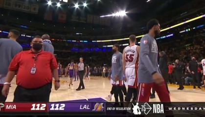  巴特勒三双热火加时险胜尼克斯  